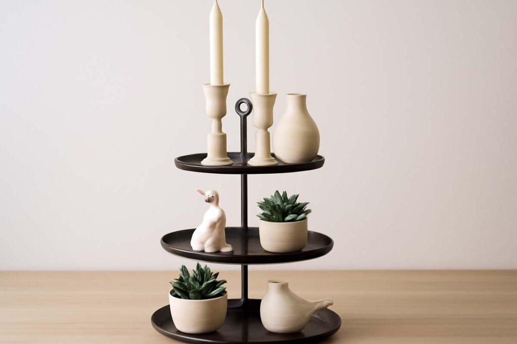 3 tier tray with varying height items creating visual interest