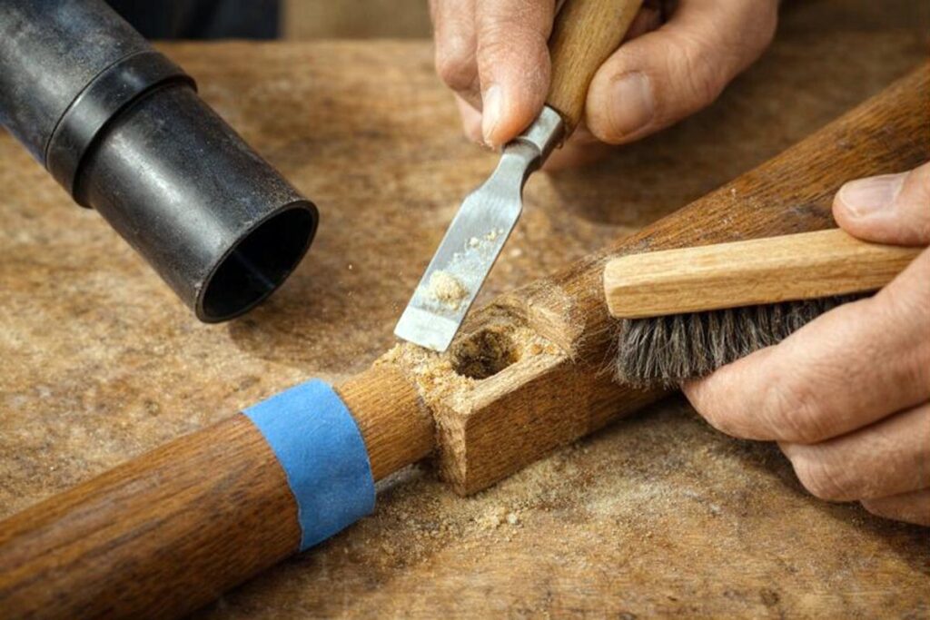 removing old adhesive before re gluing a chair rung