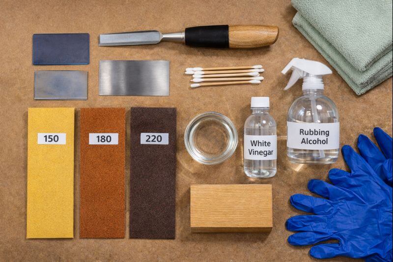 glue cleanup kit with scrapers sandpaper and vinegar