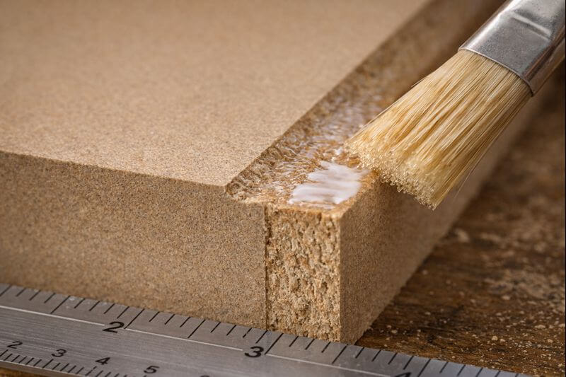close up of mdf edge absorbing sizing coat