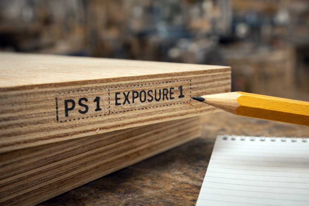 pencil pointing at plywood grade stamp