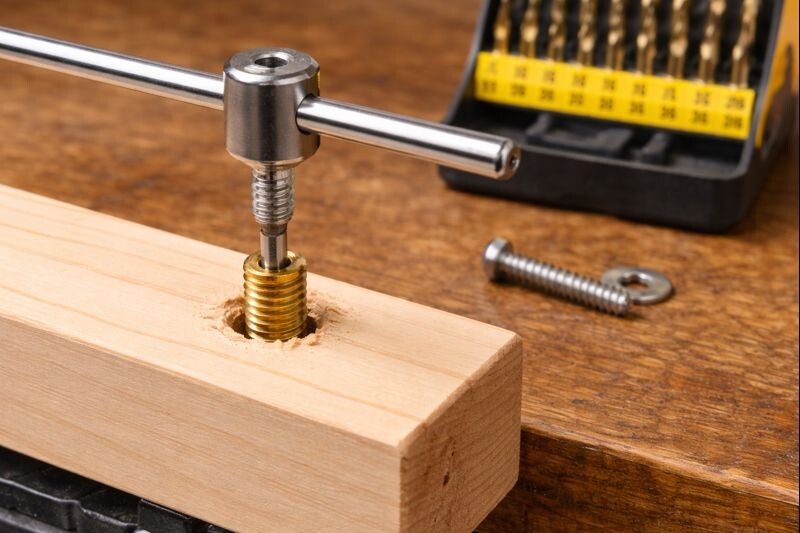 installing threaded insert for machine screw in wood