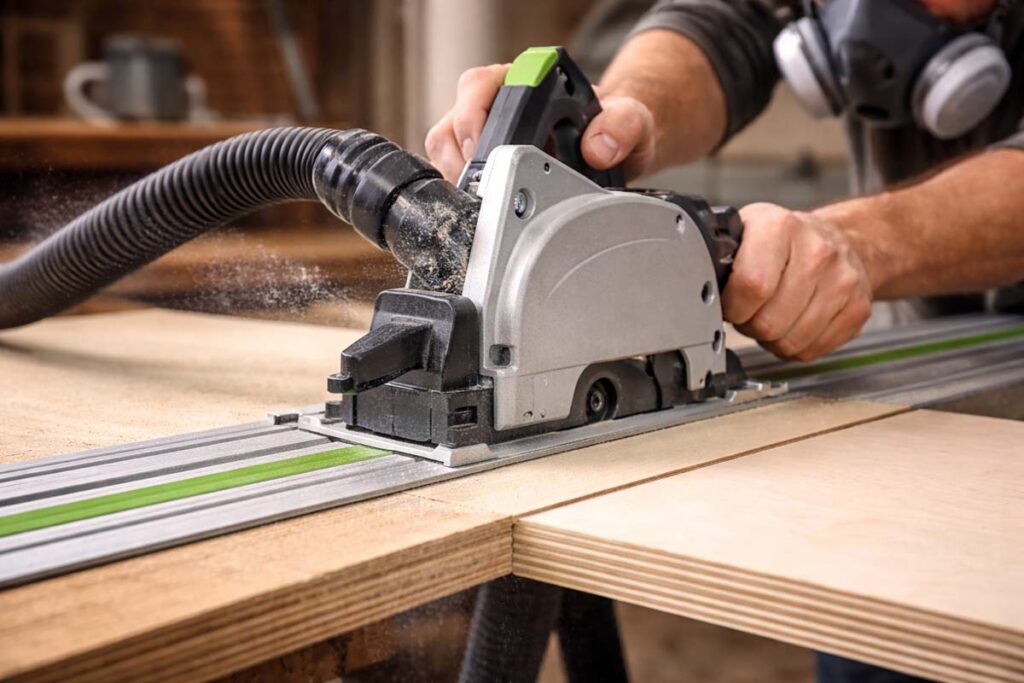 track saw making a clean cut on birch plywood