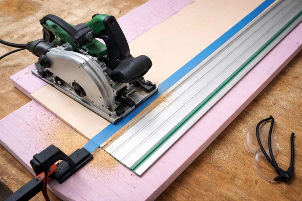 track saw cutting thin plywood on foam support